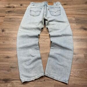 lightwash orange tab vintage 90s levi's 505 relaxed fit denim jeans